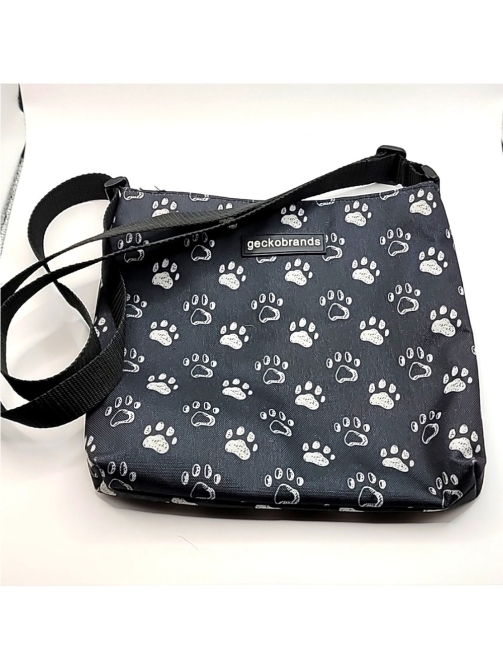 Gecko Brands paw print crossbody bag